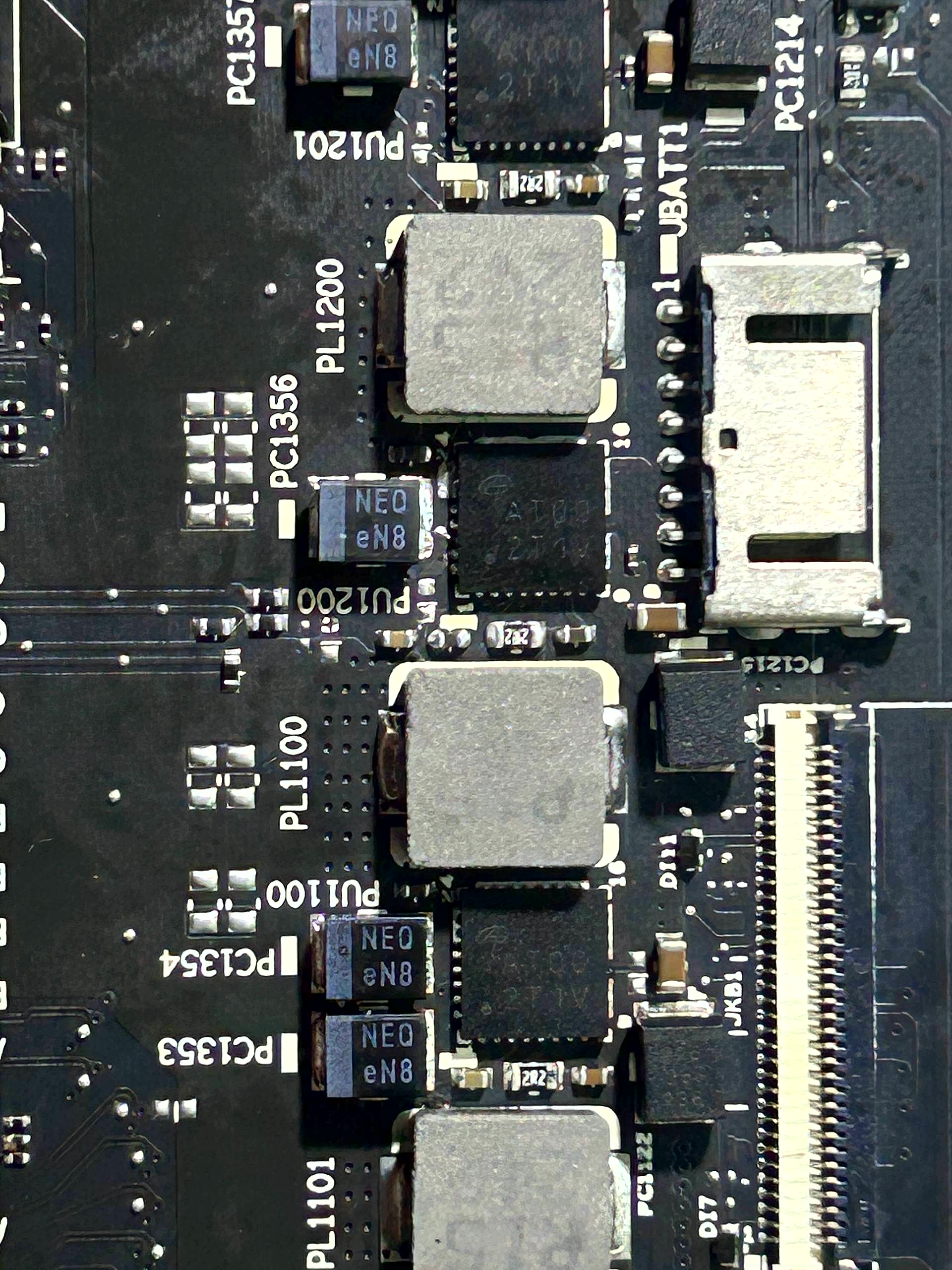 Same laptop motherboard after vSource professional repair · clean board