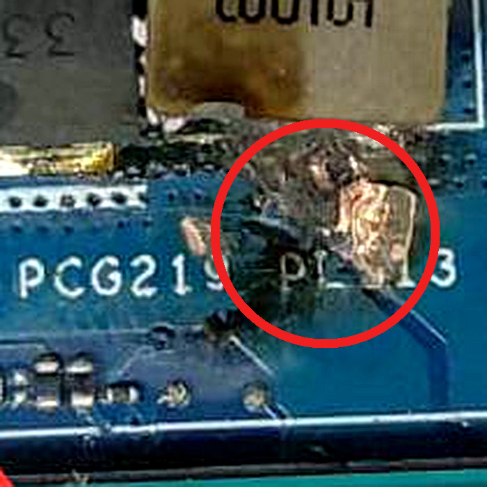 Lenovo LOQ gaming laptop motherboard with burnt CPU power section before chip-level repair at vSource Pune
