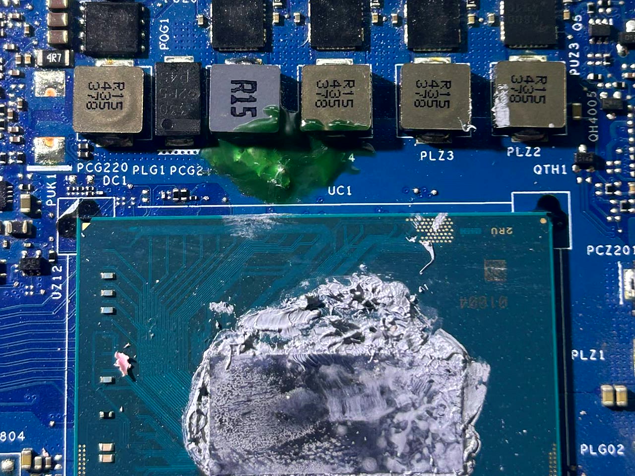 Rebuilt CPU power section with new inductor and protective coating on Lenovo LOQ motherboard at vSource Pune