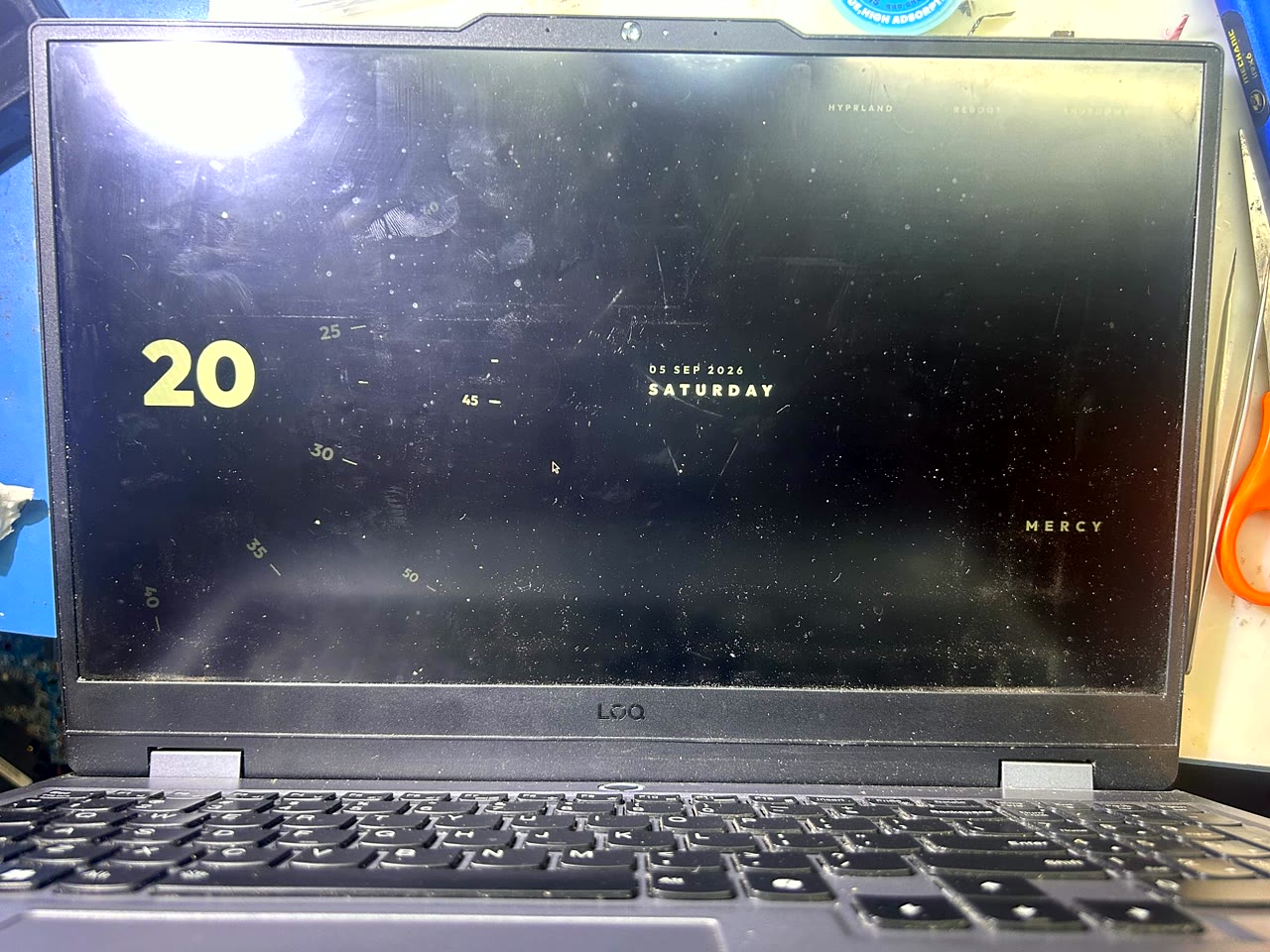 Lenovo LOQ gaming laptop powered on and running Windows after burnt motherboard repair at vSource Pune